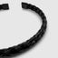 DVNCI black woven cuff bangle engraved branding detail stainless steel luxury
