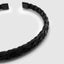 Close up DVNCI black woven cuff bangle interlaced texture detail stainless steel
