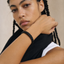 Close up DVNCI black woven cuff bangle worn model wrist detail shot luxury

