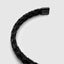 DVNCI black basket weave cuff bangle worn on wrist lifestyle shot luxury jewelry

