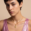 DVNCI Cancer zodiac pendant necklace model lifestyle editorial shot London luxury jewelry