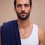 DVNCI Cancer zodiac pendant necklace worn by model lifestyle shot gold jewelry