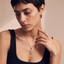 DVNCI Capricorn zodiac pendant necklace side profile 20 inch curb chain gold jewelry