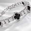DVNCI four leaf clover tennis bracelet clasp branding detail white gold luxury
