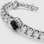 DVNCI four leaf clover tennis bracelet stacked wrist jewelry lifestyle shot luxury
