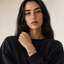 DVNCI four leaf clover tennis bracelet worn on wrist lifestyle shot white gold luxury
