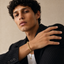 DVNCI cluster ball bracelet worn on wrist lifestyle shot 18k gold luxury jewelry