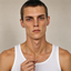 DVNCI cornicello pendant necklace worn by model lifestyle shot gold jewelry
