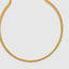 Close up DVNCI franco chain necklace interwoven V-shaped link detail yellow gold