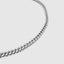 Close up DVNCI white gold franco chain necklace worn on model neck detail shot