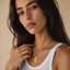 DVNCI Gemini zodiac pendant necklace flat lay product shot white background gold