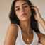 DVNCI Gemini zodiac pendant necklace overhead studio shot white background gold