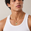 DVNCI Hamsa evil eye pendant necklace model lifestyle editorial shot London luxury jewelry
