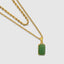 DVNCI jade pendant with wheat layered chain necklace overhead studio shot white background