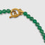 Close up DVNCI natural jade stone necklace texture detail spiritual luxury jewelry

