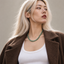 DVNCI jade natural stone necklace coiled overhead studio shot white background

