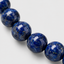 Close up DVNCI lapis lazuli natural stone bead variation texture luxury jewelry
