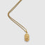 Close up DVNCI Leo zodiac pendant hammered lion symbol detail 18k gold simulated stones