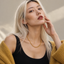 DVNCI lip link chain necklace worn by model collarbone lifestyle shot yellow gold
