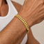 DVNCI yellow gold milgrain Cuban link bracelet flat lay product shot white background
