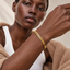 DVNCI milgrain Cuban link bracelet model lifestyle editorial shot London luxury jewelry
