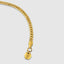 DVNCI yellow gold milgrain Cuban link bracelet worn on wrist lifestyle shot luxury jewelry
