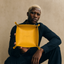 Close up DVNCI mustard yellow vegan nappa leather texture detail jewelry tray