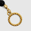 Onyx bead necklace studio shot with soft reflection on white background
