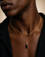 DVNCI black onyx pendant with wheat layered chain necklace worn by model lifestyle shot