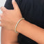 Premium yellow gold diamond tennis bracelet close-up with fine detailing