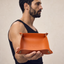 DVNCI saffron orange vegan leather jewelry tray embossed logo detail luxury