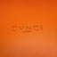 Close up DVNCI saffron orange vegan leather tray folded corner stud detail