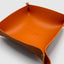 Close up DVNCI saffron orange vegan nappa leather texture detail jewelry tray