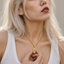 DVNCI Sagittarius zodiac pendant necklace model lifestyle editorial shot London luxury jewelry
