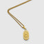 DVNCI Taurus pendant TAURUS inscription along base hand-textured gold detail
