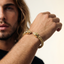 DVNCI twin skull cuff bracelet both skull terminals detail shot 18k yellow gold