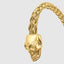 DVNCI 18k gold twin skull cuff bracelet worn model lifestyle editorial shot London