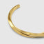 Close up DVNCI twisted cuff bangle twist detail 18k gold filled luxury jewelry
