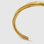 Close up DVNCI twisted cuff bangle worn model wrist detail shot 18k gold filled