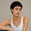 DVNCI Virgin Mary blue pearl pendant necklace worn model collarbone lifestyle shot