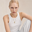 DVNCI Virgin Mary white pearl pendant necklace flat lay product shot white background