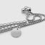 Close up DVNCI white gold cluster ball bracelet worn model wrist detail shot luxury
