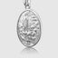 Close up DVNCI white gold Fatima medal light reflection detail Marian jewelry
