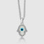 White gold Hamsa evil eye pendant necklace, angled studio shot
