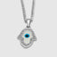 Hamsa hand open palm design, white gold setting macro shot
