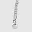 DVNCI milgrain Cuban curb bracelet light reflection across polished white gold beaded links
