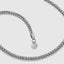 DVNCI white gold milgrain Cuban link necklace clasp and branded hexagon tag detail