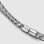 Close up DVNCI white gold basket weave cuff bangle worn model wrist detail