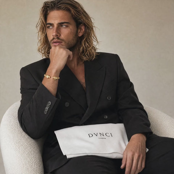 Brett wearing the double skull cuff bangle & bracelet