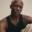 Kai wearing the stunning jade pendant, natural stone jewelry on 18k gold chain